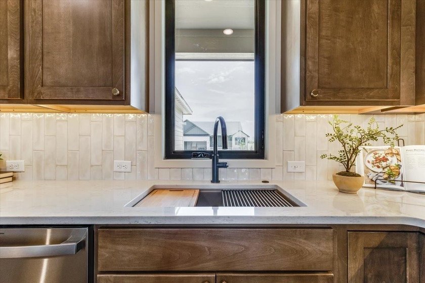 MODEL IS NOW FOR SALE! Stunning 5 Bedroom, 3 Bath Lakefront Home - photo 14