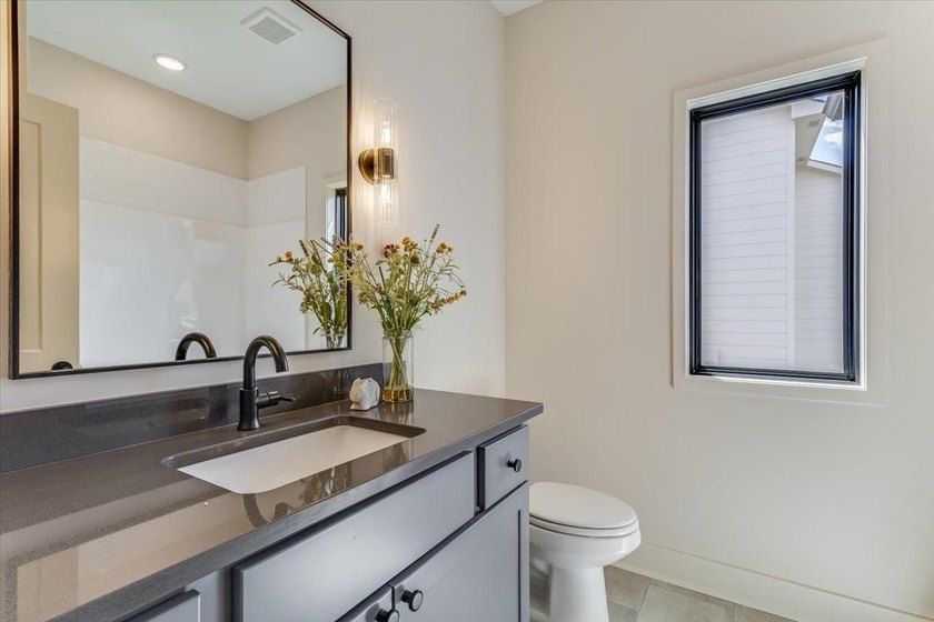 MODEL IS NOW FOR SALE! Stunning 5 Bedroom, 3 Bath Lakefront Home - photo 25