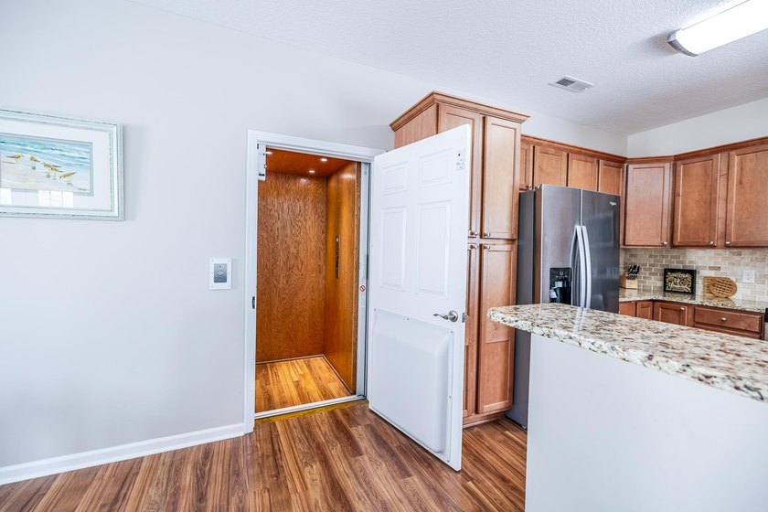 ELEVATOR ACCESS TO ALL THREE LEVELS! Welcome to 27 Palmas Drive - photo 6