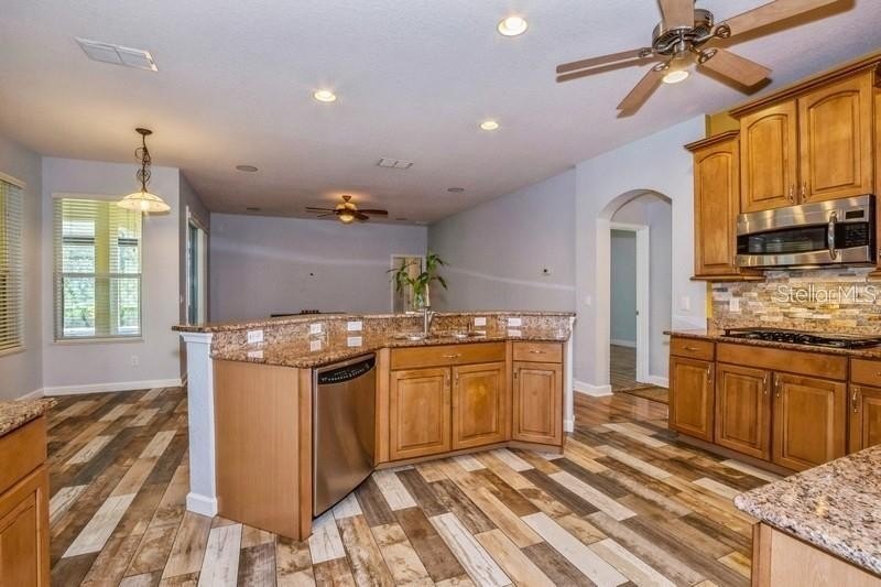 Sought After, 4-bedroom, 3 bath home with 3-CAR GARAGE located - photo 3