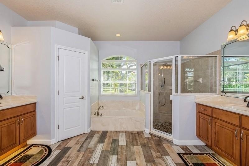 Sought After, 4-bedroom, 3 bath home with 3-CAR GARAGE located - photo 5