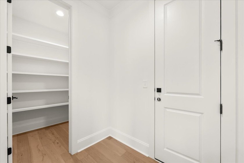 Stunning new construction, PRICED UNDER APPRAISAL, directly on - photo 16