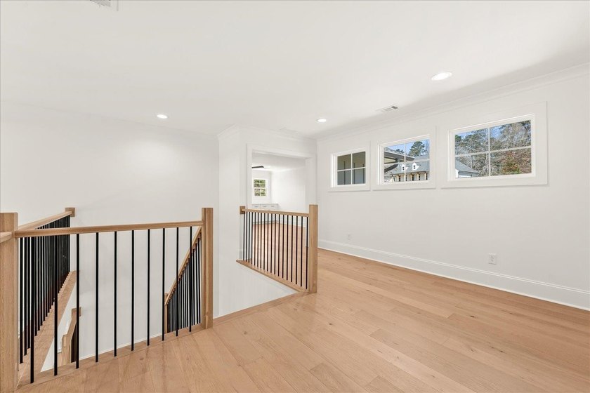 Stunning new construction, PRICED UNDER APPRAISAL, directly on - photo 32