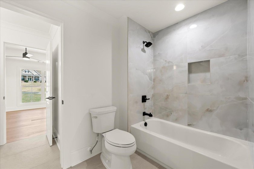 Stunning new construction, PRICED UNDER APPRAISAL, directly on - photo 44