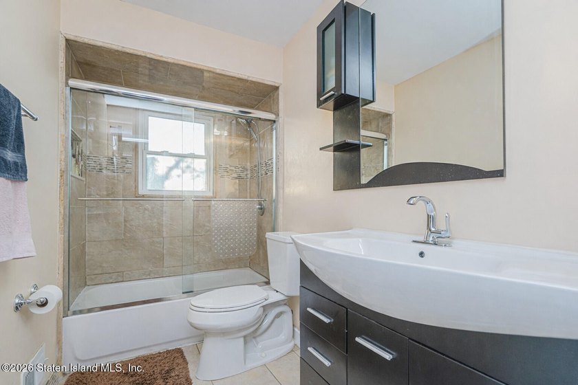 Welcome to 25 Morgan Lane, a charming brick home located in the - photo 16