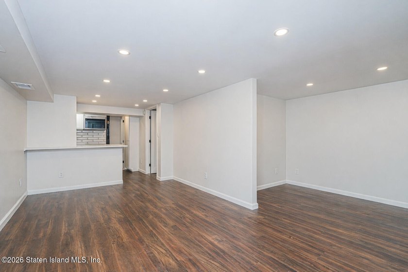 Welcome to 25 Morgan Lane, a charming brick home located in the - photo 19