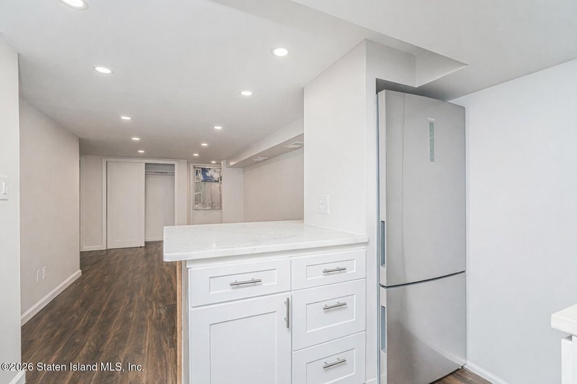 Welcome to 25 Morgan Lane, a charming brick home located in the - photo 21