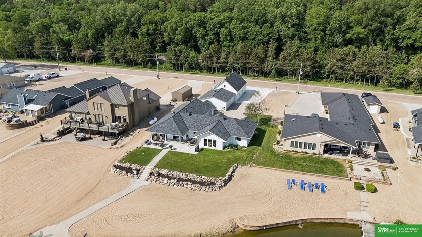 Experience lake living at its best in this beautifully updated - photo 4