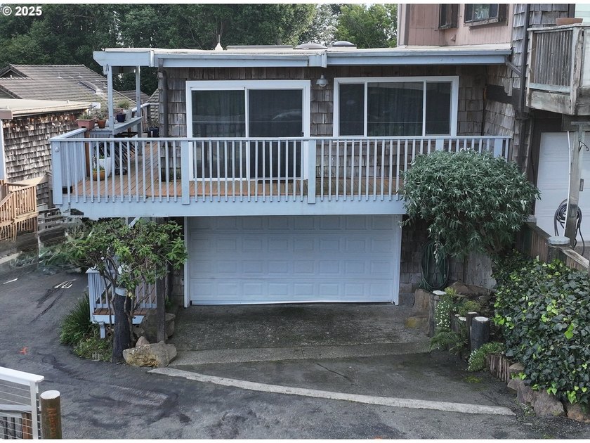 This furnished two-story condo near the Chetco River is move-in - photo 4