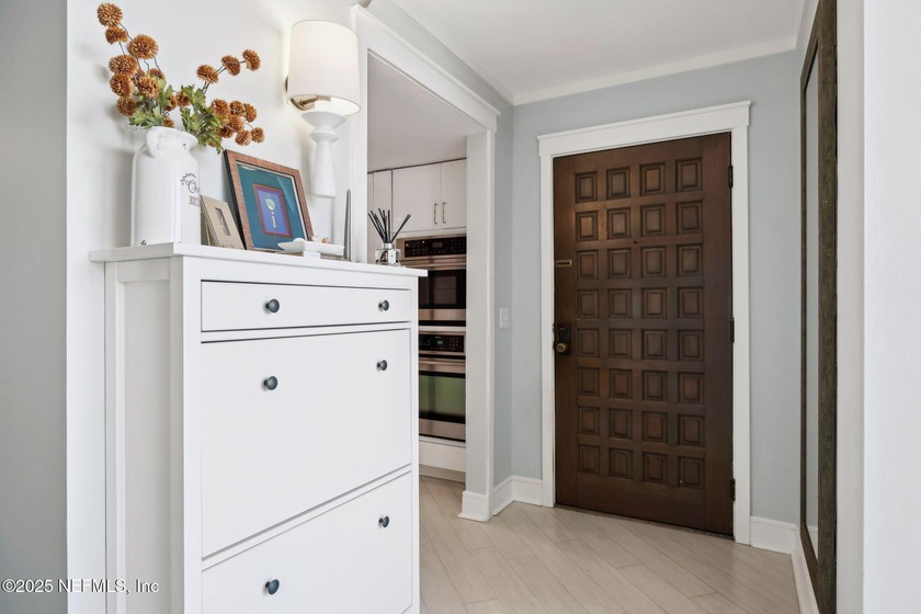 Step into coastal elegance with this beautifully updated - photo 6