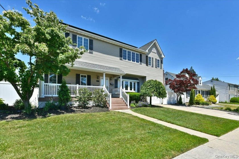 Welcome To 167 N Suffolk Avenue Set On An Oversized 70x100 Lot - photo 2