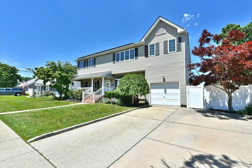 Welcome To 167 N Suffolk Avenue Set On An Oversized 70x100 Lot - photo 3