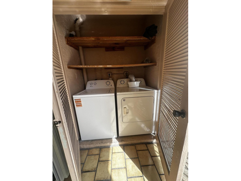 Welcome to this charming 1-bedroom, 1-bath condo offering the - photo 20