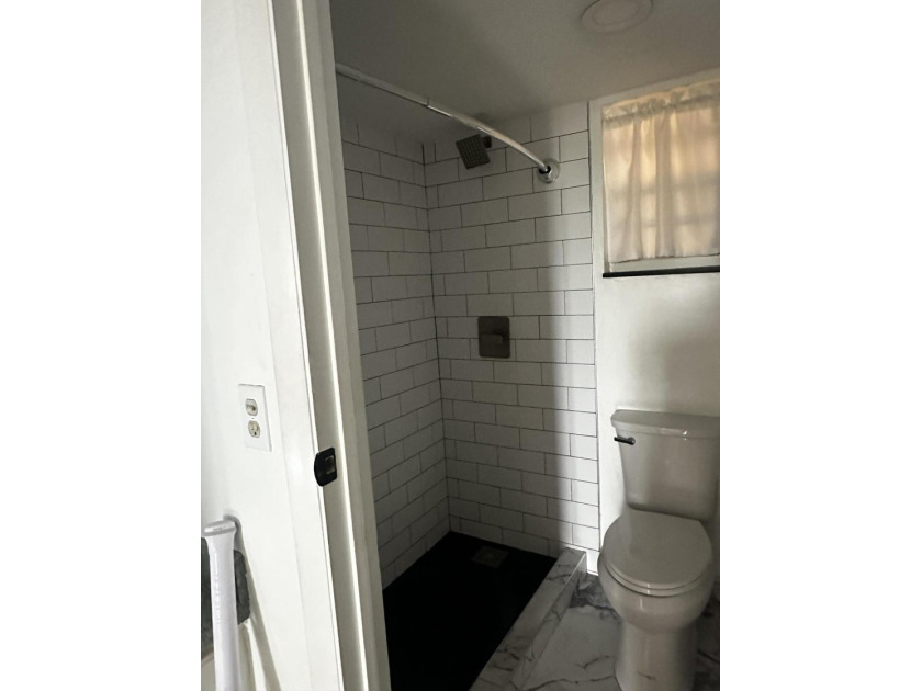 Welcome to this charming 1-bedroom, 1-bath condo offering the - photo 23