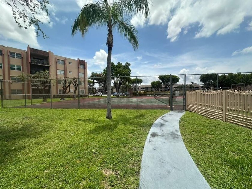 Welcome to this charming 1-bedroom, 1-bath condo offering the - photo 34