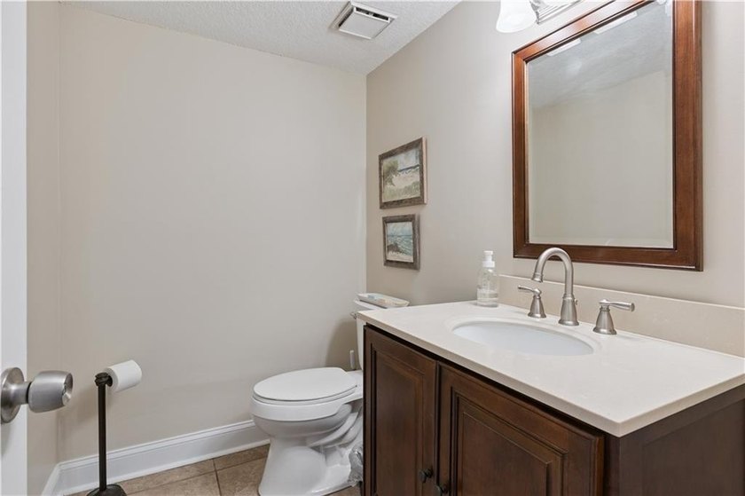 Welcome to easy coastal living in this beautifully maintained - photo 12
