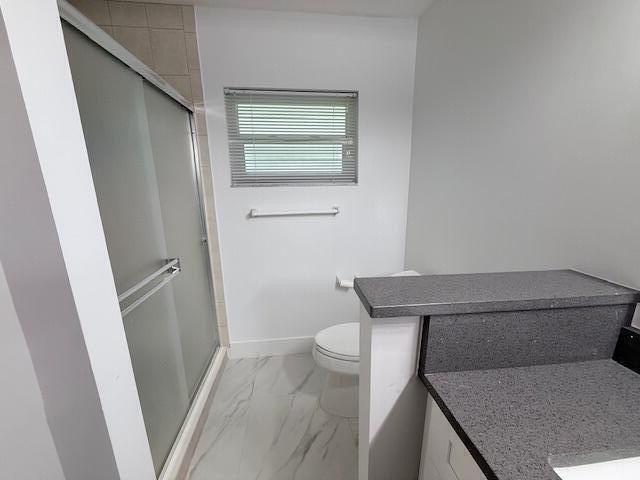 Ultra-modern remodel on this spacious end condo situated on the - photo 17