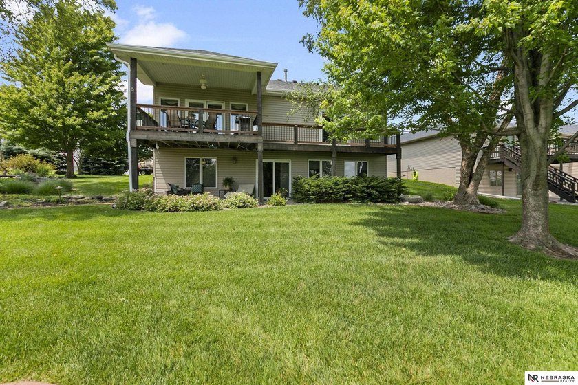 Enjoy sweeping golf course views from this ideally located brick - photo 4