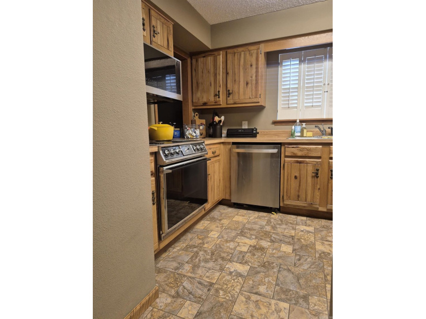 This Bottom Level 2-bedroom condo provides lake life right at - photo 4