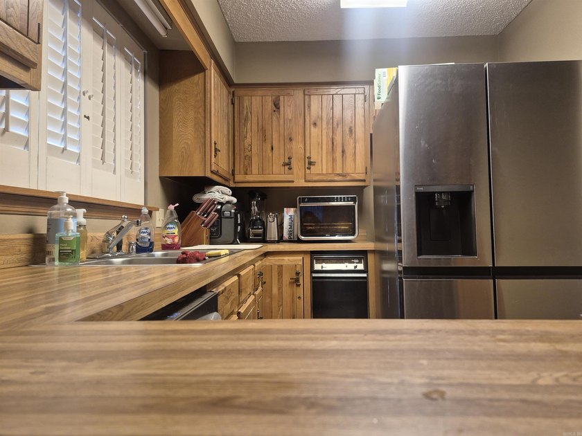 This Bottom Level 2-bedroom condo provides lake life right at - photo 5