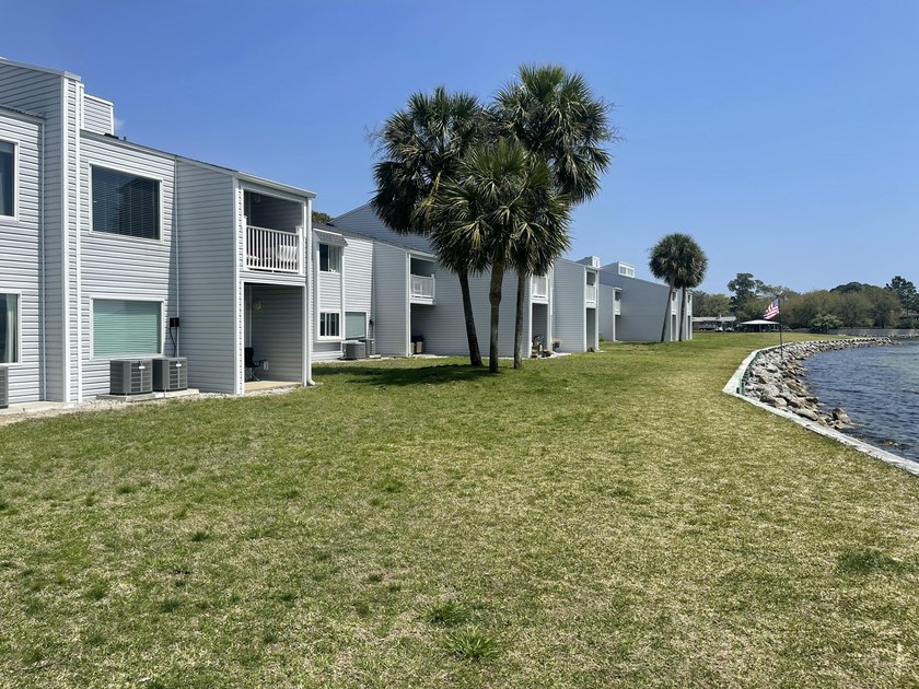 Welcome to Finisterra Condominiums, a gated waterfront community - photo 26