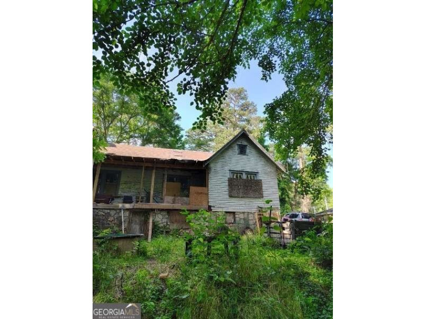 Rare 9.5-Acre Haven with Spring-Fed Pond, Multiple Structures &amp; - photo 29