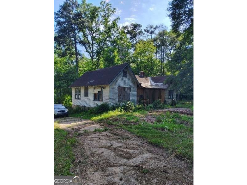 Rare 9.5-Acre Haven with Spring-Fed Pond, Multiple Structures &amp; - photo 32