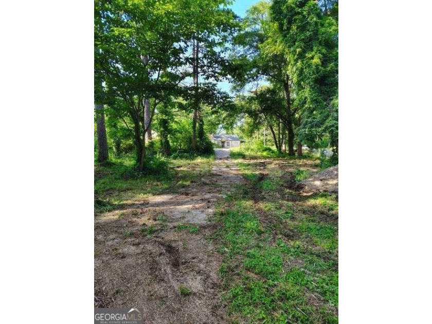 Rare 9.5-Acre Haven with Spring-Fed Pond, Multiple Structures &amp; - photo 33