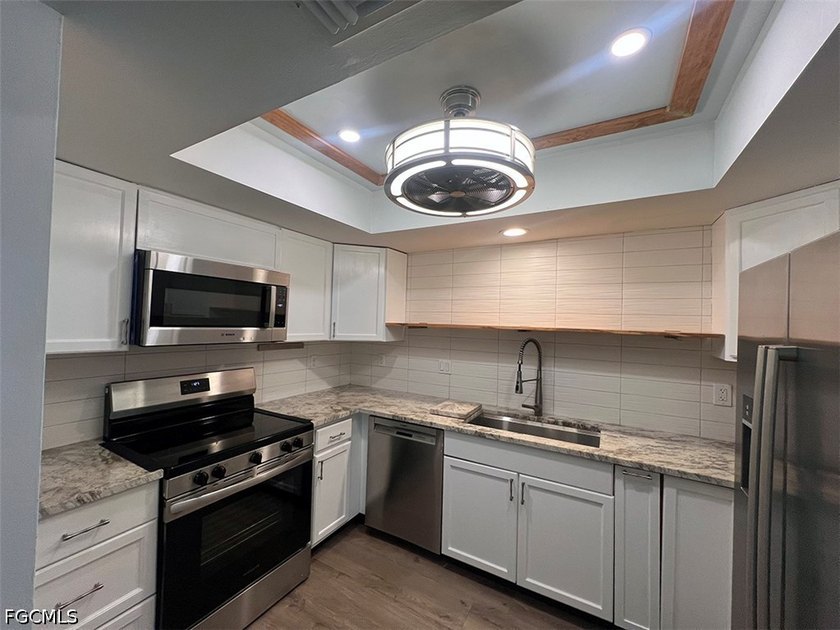 Welcome to this beautifully updated condo in the heart of Cape - photo 4