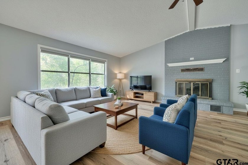 Nestled on a quiet street, this inviting residence blends - photo 6