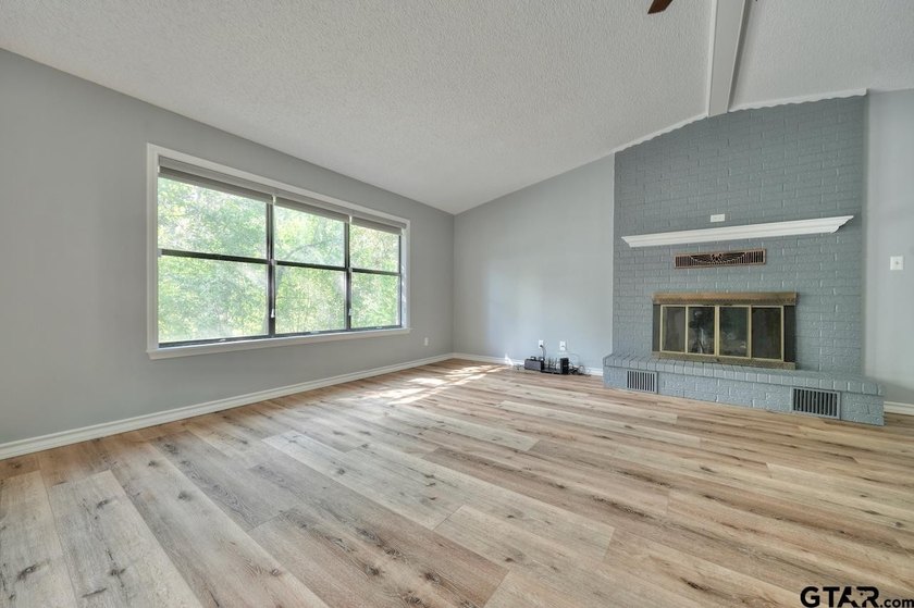 Nestled on a quiet street, this inviting residence blends - photo 7
