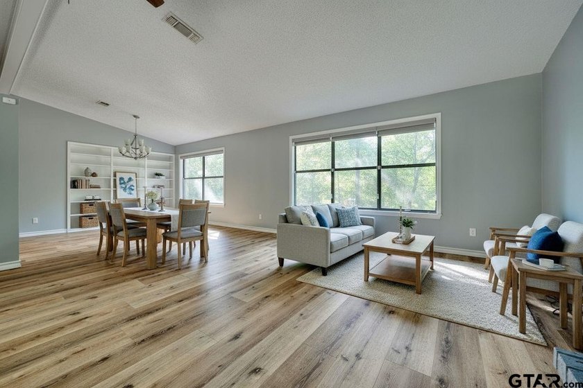 Nestled on a quiet street, this inviting residence blends - photo 9