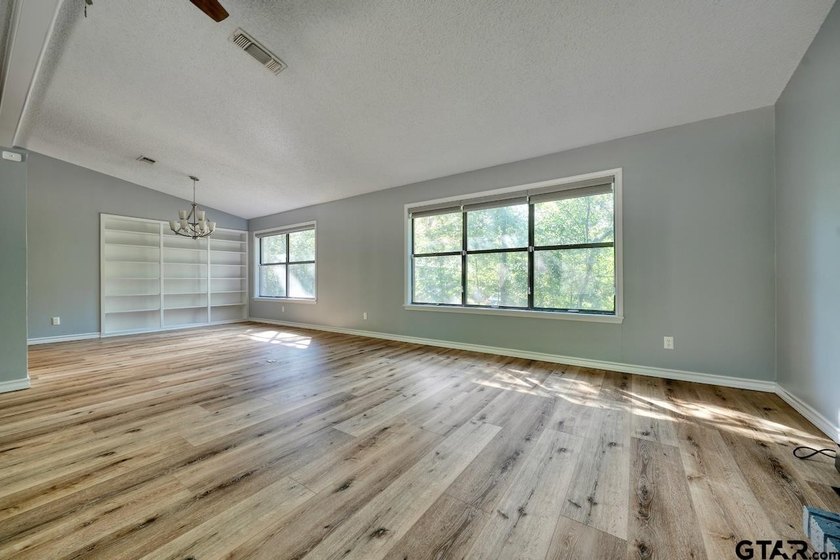 Nestled on a quiet street, this inviting residence blends - photo 10