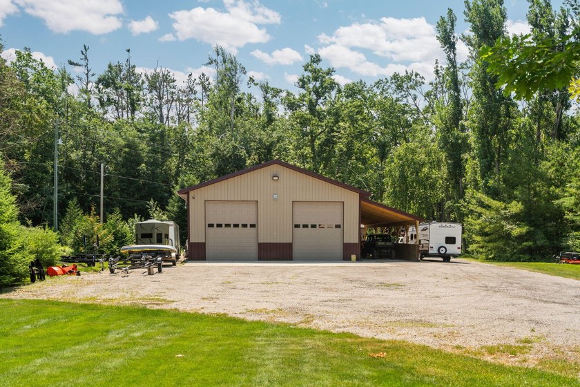 Experience exceptional lakefront living with 100 feet of - photo 13