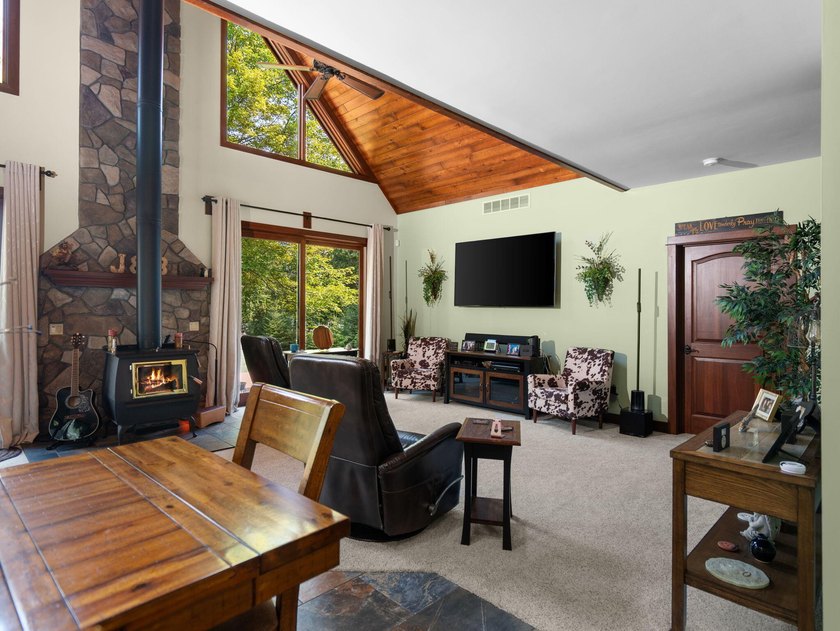 Experience exceptional lakefront living with 100 feet of - photo 15