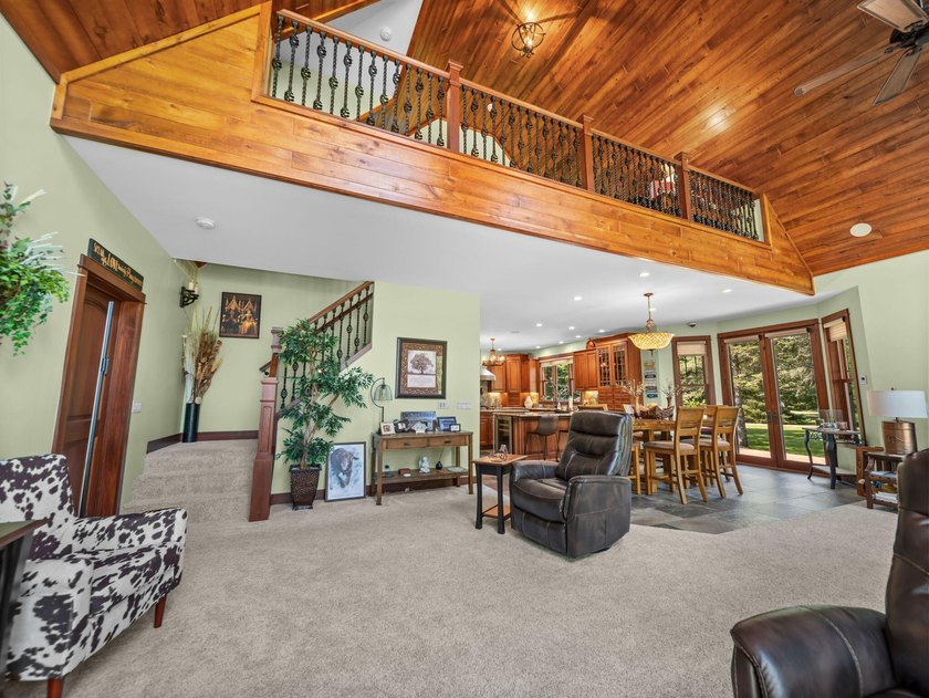 Experience exceptional lakefront living with 100 feet of - photo 17