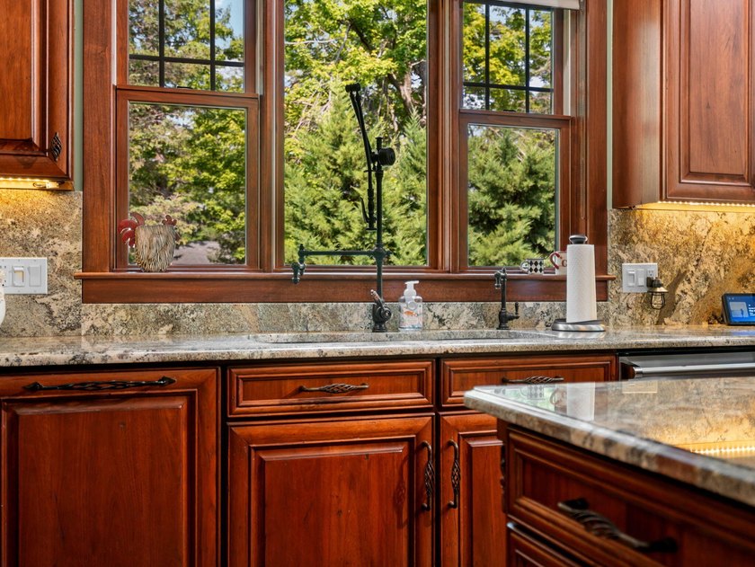 Experience exceptional lakefront living with 100 feet of - photo 23