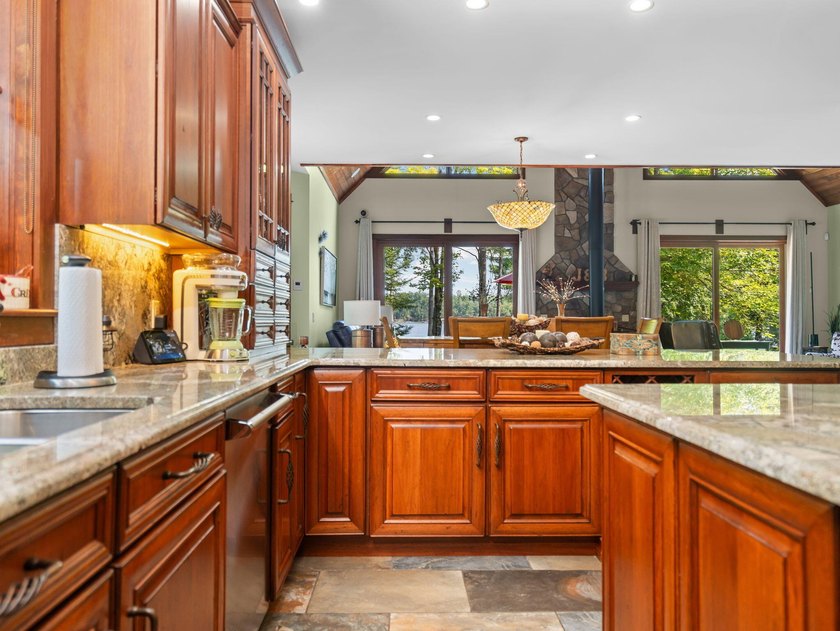 Experience exceptional lakefront living with 100 feet of - photo 24