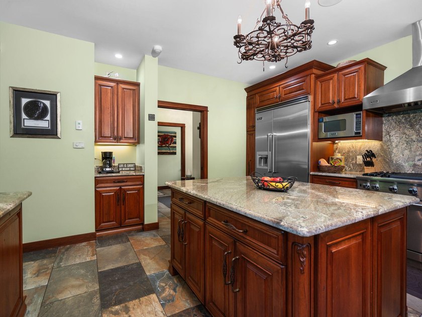 Experience exceptional lakefront living with 100 feet of - photo 25