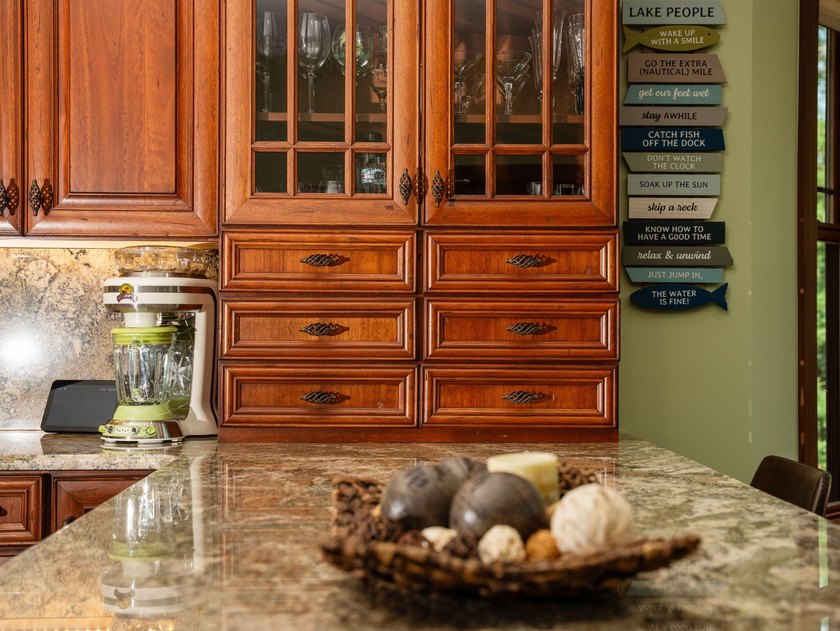 Experience exceptional lakefront living with 100 feet of - photo 33