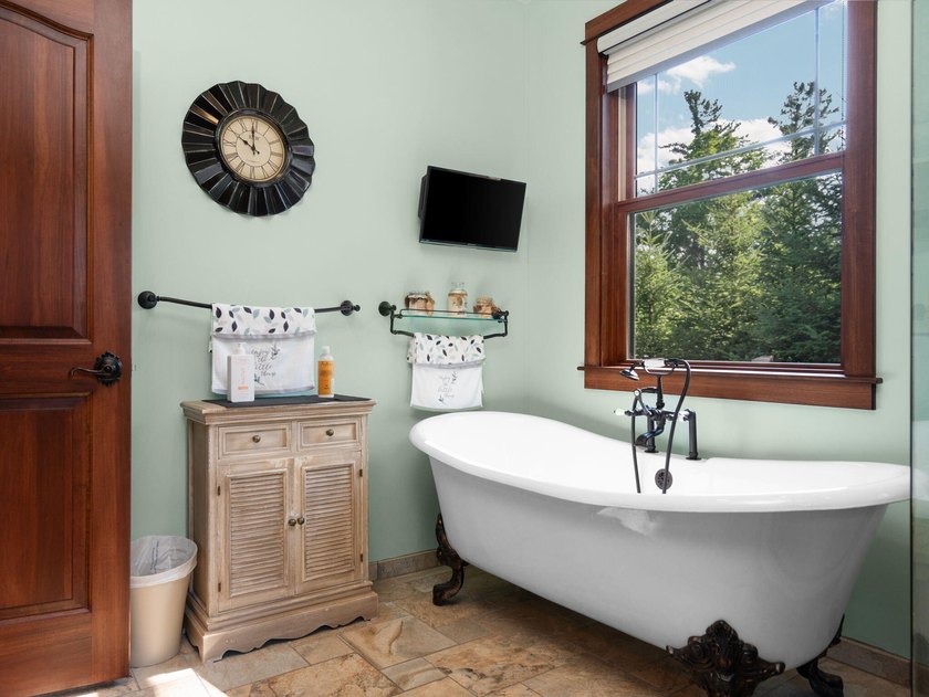 Experience exceptional lakefront living with 100 feet of - photo 46