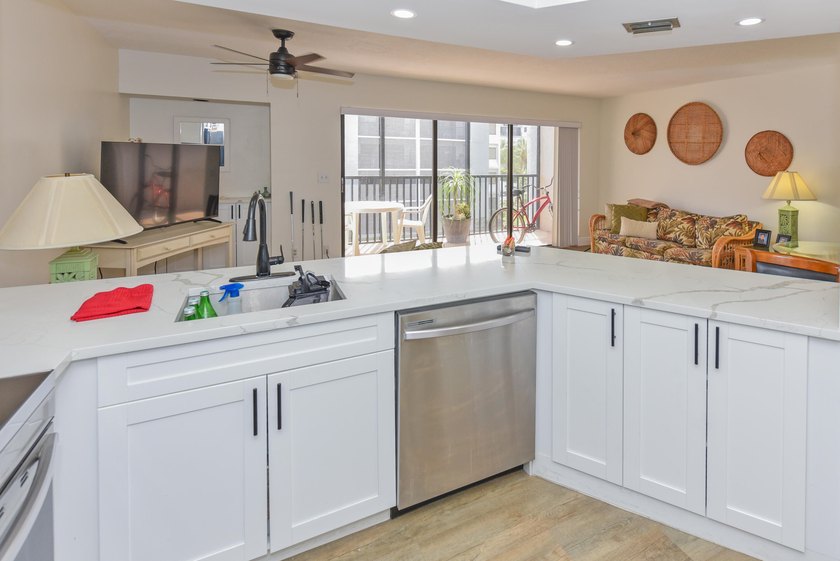 Welcome to your next smart move - a fully remodeled coastal - photo 4