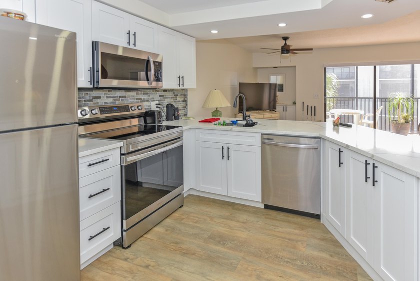 Welcome to your next smart move - a fully remodeled coastal - photo 5