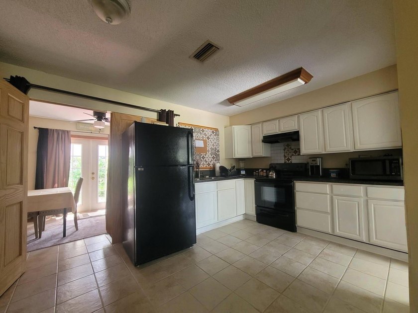 Welcome to this charming concrete block home in desirable - photo 14