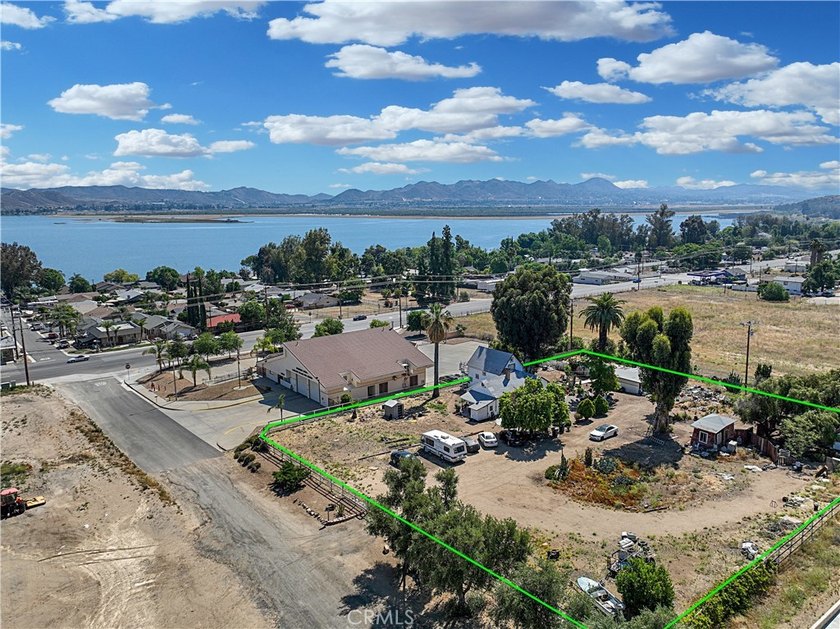 Commercially zoned land represents the true value of this rare - photo 2