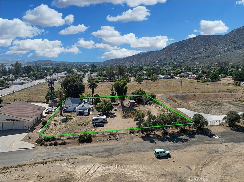 Commercially zoned land represents the true value of this rare - photo 3