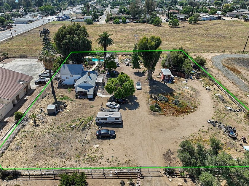 Commercially zoned land represents the true value of this rare - photo 4