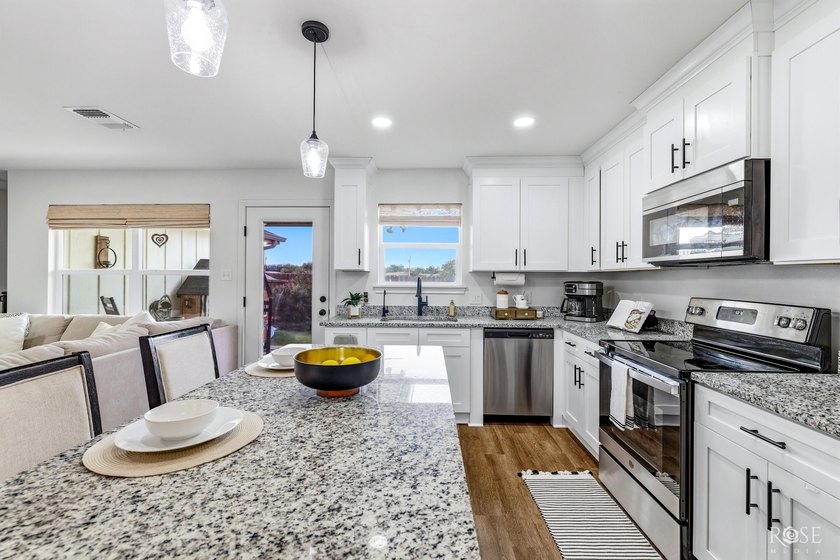 Welcome home to this beautifully 2023 maintained one-owner - photo 13