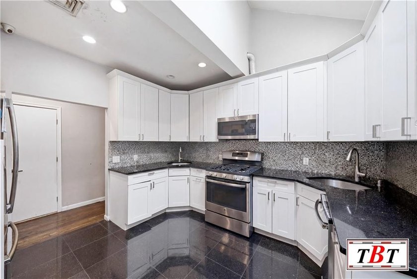 Welcome to 1855 east 13th street. A beautiful 2 family home in - photo 16