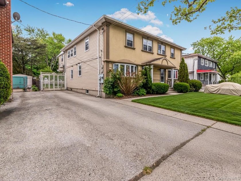 Rare 2-family semi-detached home located in the desirable - photo 2